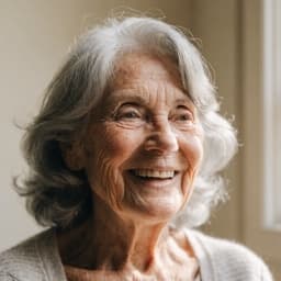 A smiling senior woman with silver hair